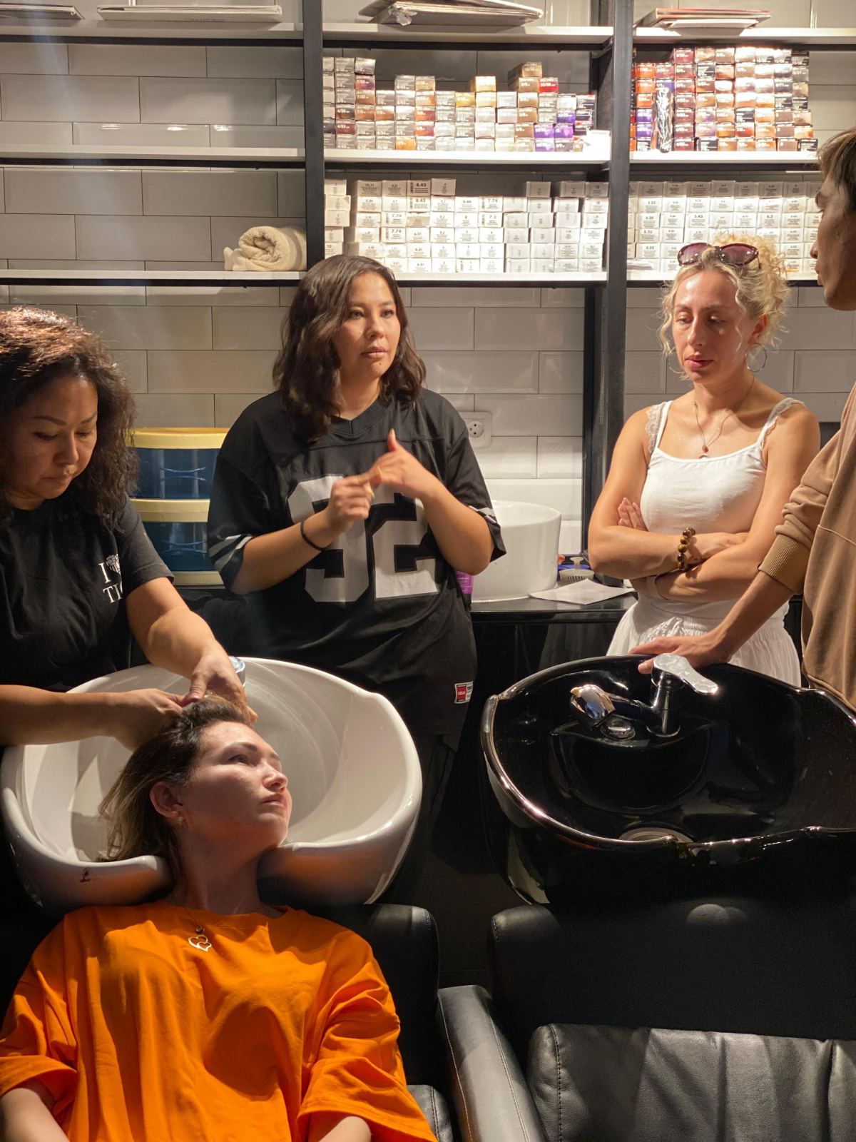 SuperMe stylists at the wash basin